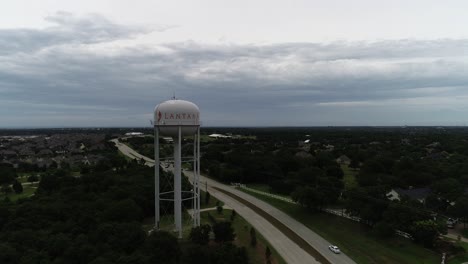Aerial-footage-of-the-city-of-Lantana-water-tower-after-a-storm