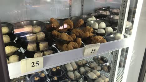 Freshly-prepared-dim-sum-in-fridges-for-personal-selection-and-life-cooking-demand