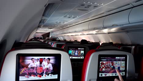 entertainment-inside-commercial-airplane-cabin