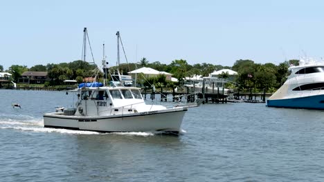 SLOMO-24FPS:-Fishing-boat---vesal-returning-to-the-harbor-on-a-beautiful-sumer-day