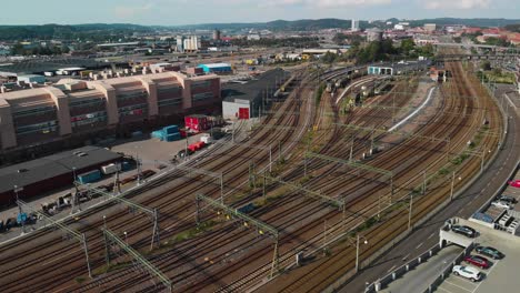 Aerial-view-over-the-rails-going-into-Gothenburg-Central-Station-wih-trains-and-trams