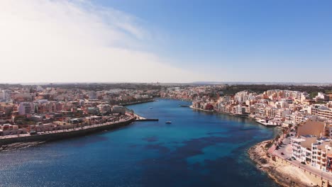 Aerial-drone-video-from-Malta,-Marsaskala-and-Zonqor-area-on-a-sunny-spring-day