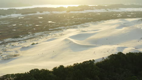 Sand-dunes-sunset-at-Praia-Da-Joaquina,-Florianopolis-city,-Santa-Catarina,-Brazil