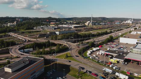 Aerial-view-of-the-big-roundabout-over-the-big-road-Alingsasleden-E20-located-in-Gothenburg,-Sweden