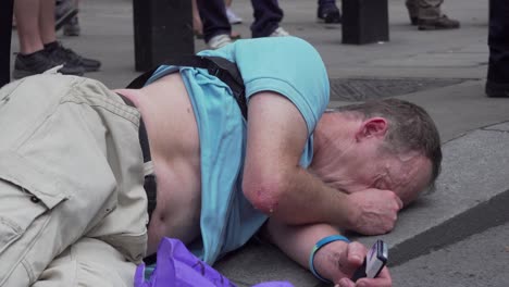 A-Tommy-Robinson-supporter-is-knocked-to-the-ground-whilst-being-arrested-along-Whitehall,-London