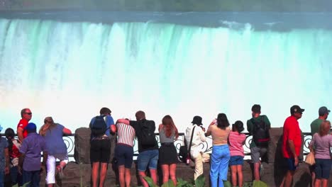 A-group-of-tourists-gazing-at-Niagara-Falls
