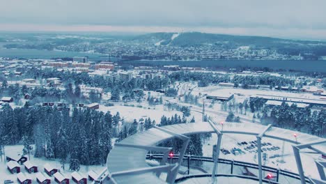 Aerial-flyover-Arctura-restaura-revealing-Östersund-skyline-on-a-winter-day