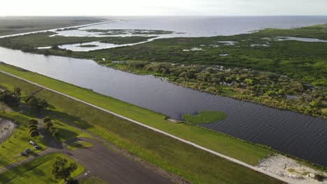 the-incredibly-green-landscape-of-the-water-management-levee-in-south-Lake-Okeechobee,-Florida,-United-States
