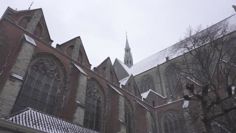 Hooglandse-Kerk-Gothic-church-in-Leiden,-covered-in-winter-snow,-Netherlands