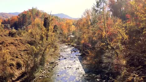 Drone-flight-autumn-over-river---Pigeon-Forge-Tennessee