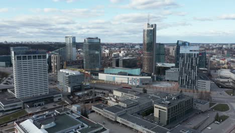 AERIAL:-Business-District-in-Vilnius-with-Cityscape-Panorama-in-Background