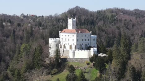 White-walls-of-castle-Trakoscan-on-top-of-a-small-hill-is-popular-landmark-and-often-photographed-in-Croatia
