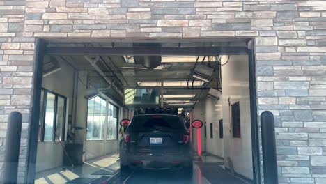 The-car-is-being-prepped-for-an-Automatic-car-wash,-view-from-inside-the-car-interior