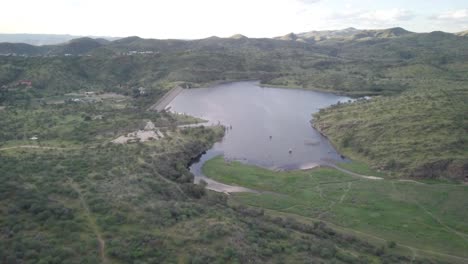 Aerial-zoom-out-shot-of-Avis-Dam-in-Windhoek-Namibia