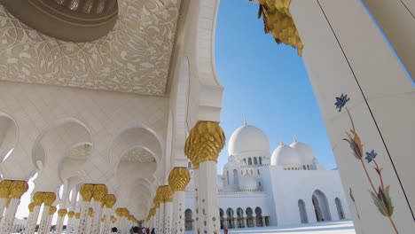Visitor-walking-point-of-view-of-Sheikh-Zayed-Grand-Mosque,-Abu-Dhabi