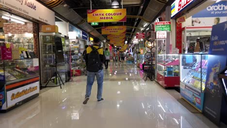 Walking-tour-of-IT-equipment-store-during-the-Covid-19-epidemic-situation-at-Fortune-Tower-Mall-Bangkok,-Thailand