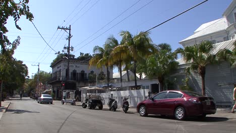 Famous-Duval-Street-and-the-historic-Whistle-Bar-in-the-downtown-district,Key-West,-Florida,-USA