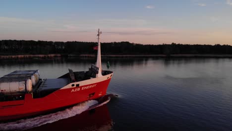 A2B-ENERGY-Inland-Shipping-Vessel-With-Sailing-In-The-River-At-Dusk-In-Netherlands