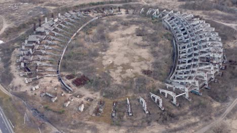 AERIAL:-Rotating-Shot-of-Ruined-and-Abandoned-Lithuania-National-Stadium-in-Vilnius