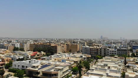 Aerial-Over-DHA-Phase-6-Buildings-In-Karachi,-Pakistan