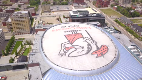 Drone-Shot-of-the-top-of-Little-Caesars-Arena-in-Downtown-Detroit