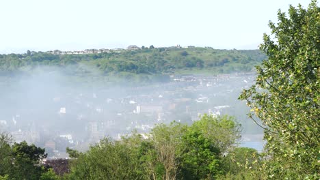Time-lapse-of-mist-moving-in-from-the-English-Channel-over-Dover-town-on-a-sunny-summer-day