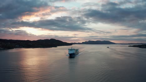 Reverse-aerial-following-from-the-bow-of-general-cargo-ship-Samskip-Kvitbjorn---Fjord-Shipping---Norway