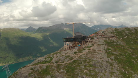 Eggen-Restaurant-Building-With-Tower-Crane-Offering-Mountain-Views-And-Fjord-In-Andalsnes,-Norway