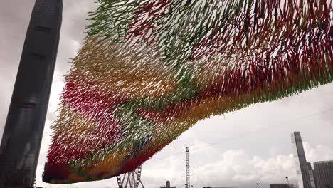 River-of-light-art-installation-by-Poetic-Kinetics-in-downtown-Hong-Kong,-composed-of-over-45000-pieces-of-sailcloth