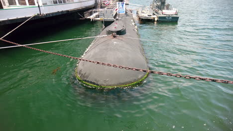 Old-USS-Dolphin-Submarine-And-The-Ferryboat-Berkeley-Housing-The-Maritime-Museum-Of-San-Diego-In-California,-USA