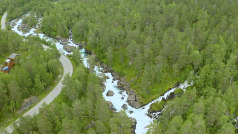 Panoramic-View-Of-Forest-And-Rocky-Stream-In-Gudbrandsjuvet,-Norway---aerial-shot