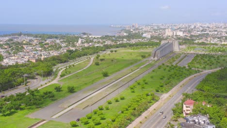 Faro-a-Colon-in-Santo-Domingo-with-ocean-in-background,-Dominican-Republic
