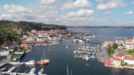 Scenic-aerial-view-of-Kragero-town-marina,-Norway---tourist-hotspot
