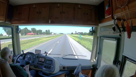 double-time---POV-of-man-driving-a-Class-A-recreational-vehicle-on-the-interstate