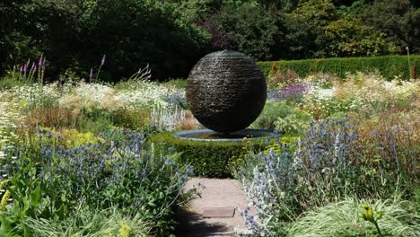 Cawdor-Castle-water-feature-surrounded-by-flowers