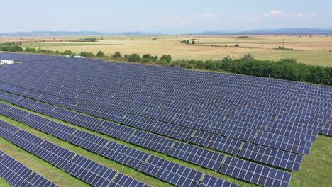 Aerial-View-Of-Solar-Panels-In-A-Solar-Energy-Farm-Under-Sunlight