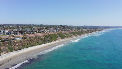 Aerial-view-of-a-coastal-city-and-sand-beaches-on-a-summer-day-in-California