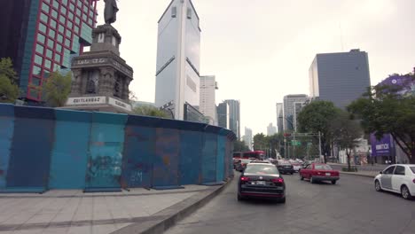 Touring-through-the-streets-of-Mexico's-City-downtown-shot-from-a-car-perspective