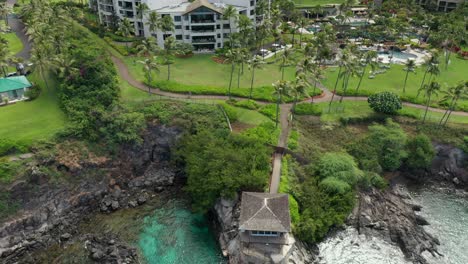 Aerial-reveal-of-the-Montage-hotel-in-Kapalua-Maui,-Hawaii