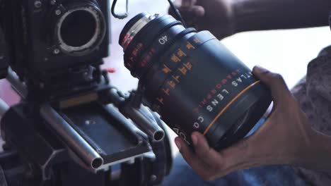 Cameraman-Holding-Atlas-Orion-Series-40mm-Anamorphic-Prime-Lens-On-Film-Set