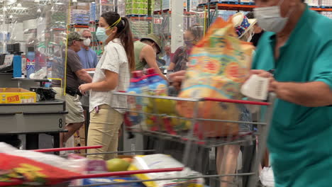 Shoppers-and-Cashiers-wear-masks-at-Costco-during-Delta-Variant-on-the-rise-in-USA