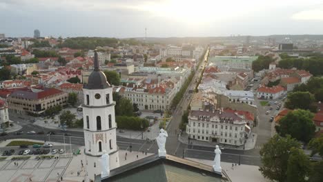 AERIAL:-Flying-Over-Vilnius-Cathedral-Towards-Gediminas-Avenue-on-a-Summer-Evening