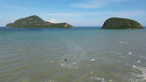 A-man-on-his-Jet-Ski-dropping-another-man-in-the-water-he-waves-to-the-camera