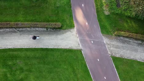 Drone-shot-from-above-of-a-guy-riding-his-bike