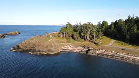 Drone-approaching-Neck-Point-Park-in-Nanaimo,-British-Columbia-during-late-afternoon-with-medium-speed