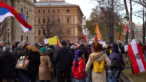 Crowd-of-many-covid-measures-protesters-in-streets-of-Vienna,-Austria