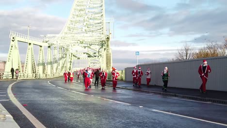Slow-motion-Charity-Santa-street-dash-fun-run-across-Runcorn-Silver-Jubilee-bridge