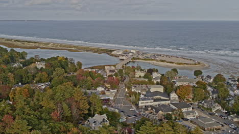 Ogunquit-Maine-Aerial-v7-cinematic-shot-drone-fly-around-downtown-capturing-river-inlet,-sandy-beach-and-beautiful-townscape-in-autumn-season---Shot-with-Inspire-2,-X7-camera---October-2021