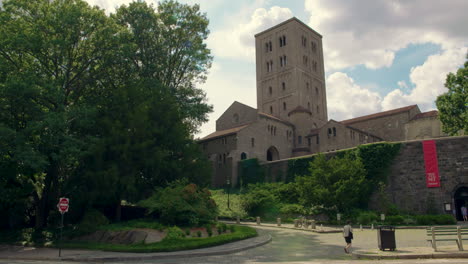 People-Enter-Cloister-Museum-In-New-York-City-On-Sunny-Summer-Day