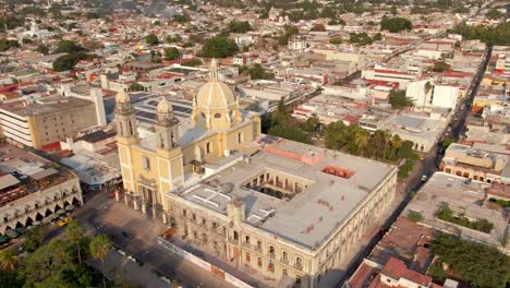 Bird's-Eye-View-Of-Cathedral-Basilica-of-Colima-With-Government-Palace-In-Colima-City,-Mexico